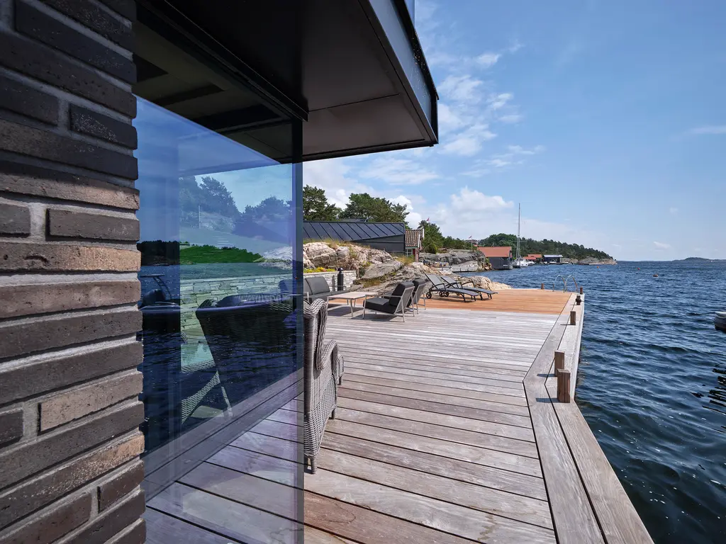 Fruens allé, Kristiansand, Norge: Schüco skydedør, Reynaers CW 50, Slimline 38 og pivotdør